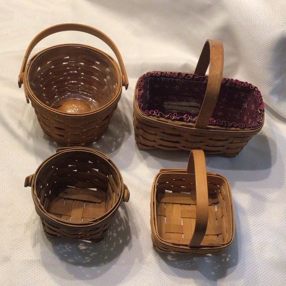 Set of four small to medium Longaberger baskets.